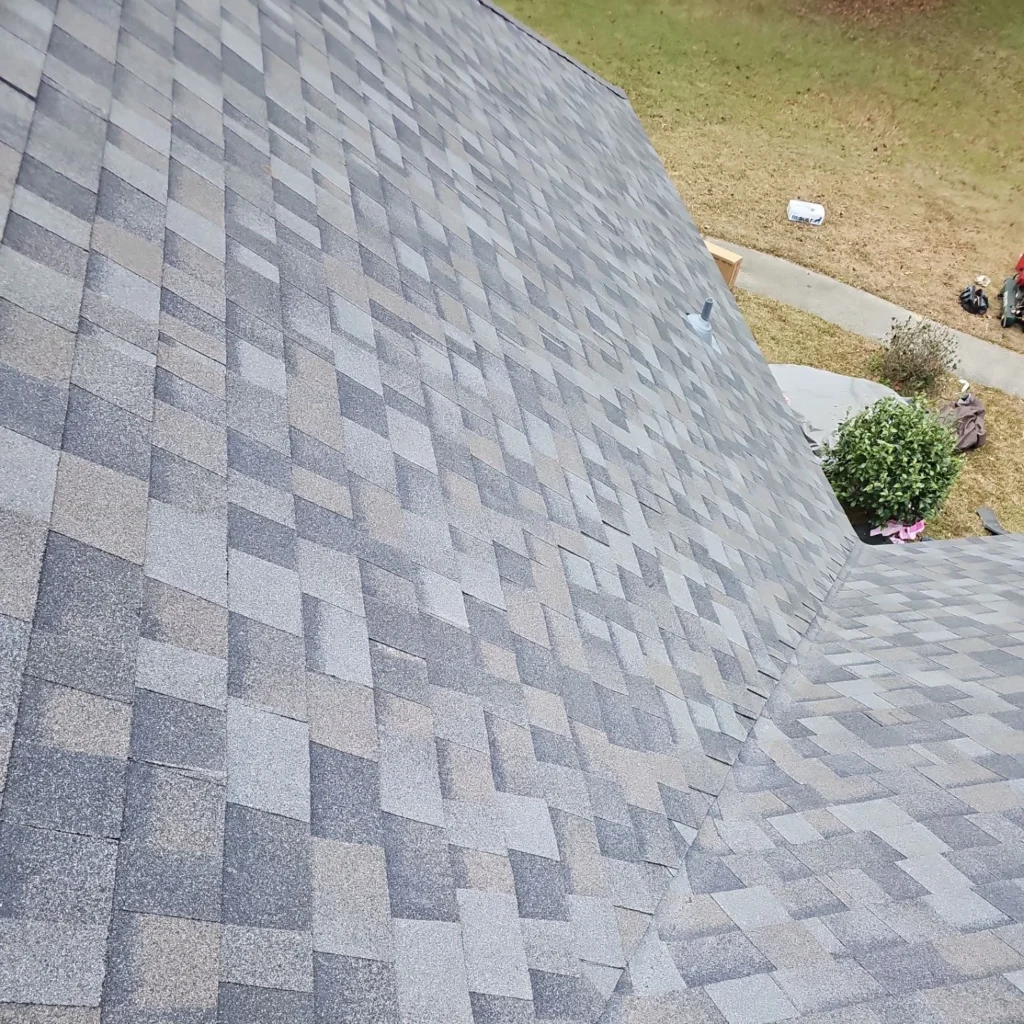 Large residential roof replacement with Owens Corning Williamsburg Gray architectural shingles, pipe boot vent, Covington LA.
